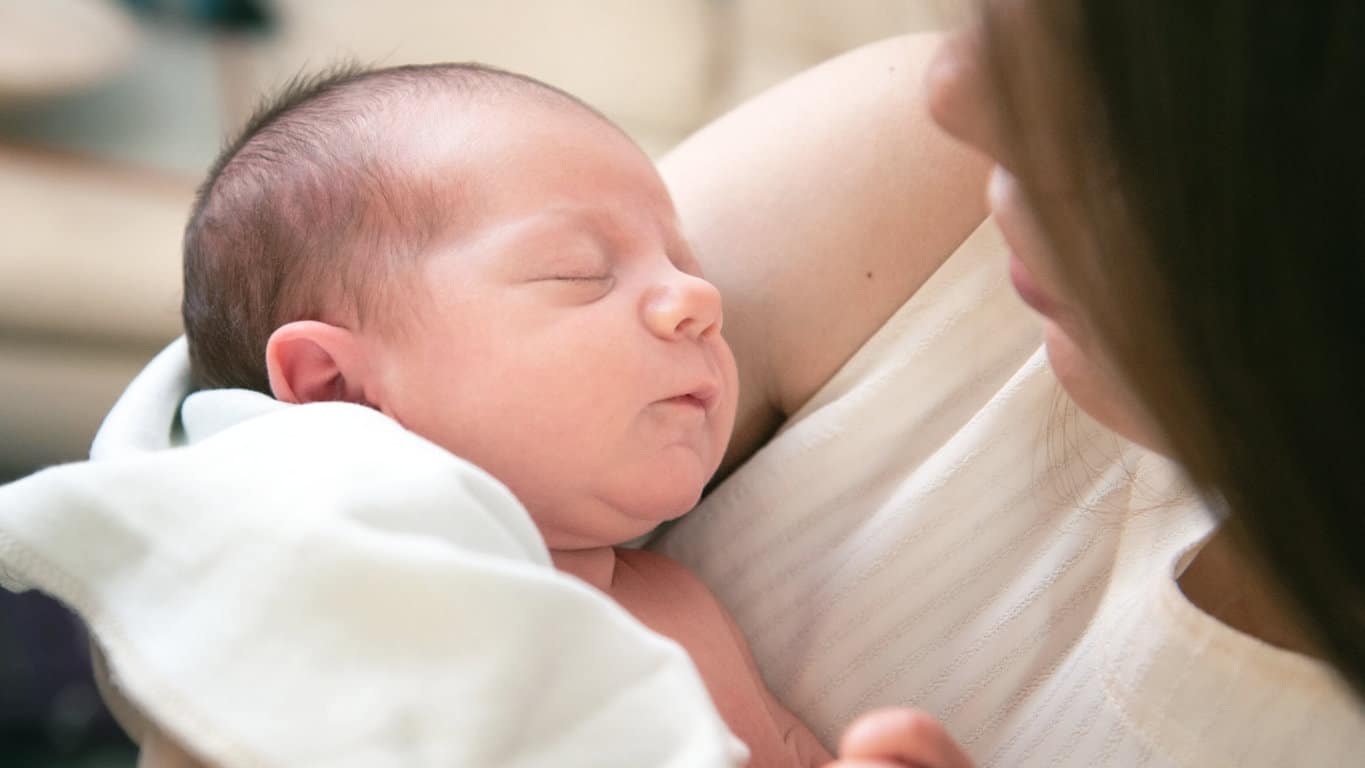 maternity nurse with a new born baby